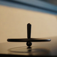 Thumbnail for Spinning Suspended Tops